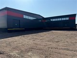 Продажа отапливаемого склада с пандусом 2227 м² на земельном участке 0,5 га