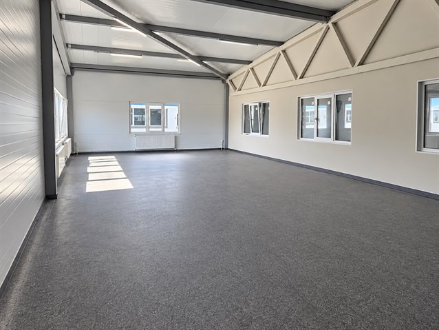 Производственно-складской комплекс 1083 м² с отоплением, участком, мощностью 150 кВт в 4,5 км от КАД — продажа